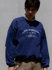 Ranger Crewneck Navy - paint splatter and sun wash finish close-up - Rincon